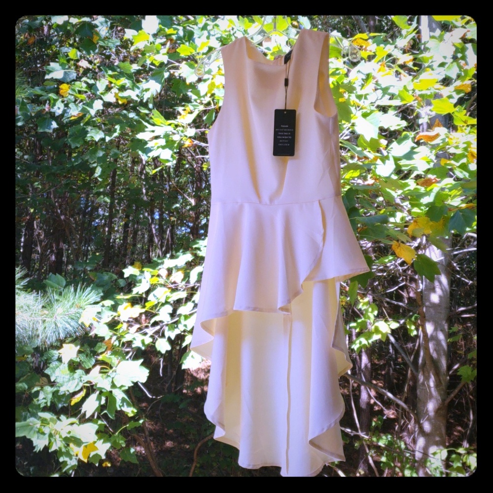 Creame Peplum Top